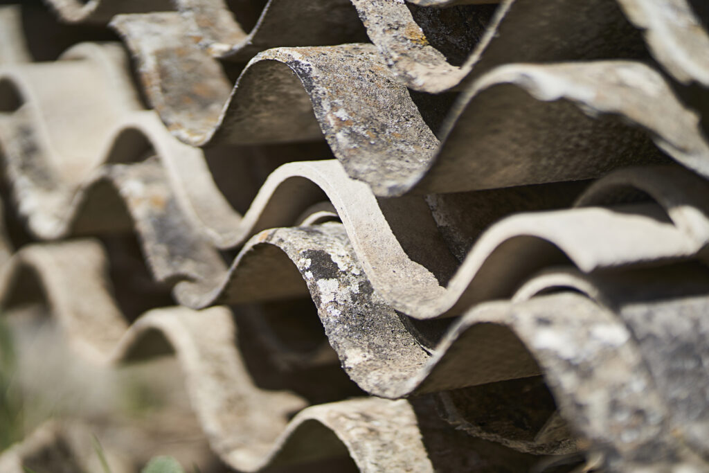 toxic waste with asbestos from piled up asbestos sheets